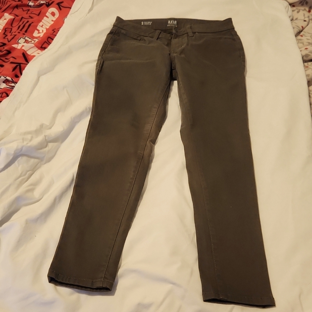 A new pair of a.n.a size 2 Skinny Ankle, A New Approach, dark green jeans. New